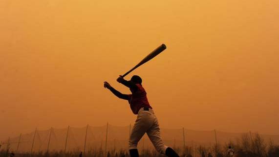 Humans to blame for Sandstorms? China smothered in orange haze.