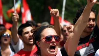 Masks off at G8 protest: rally leader