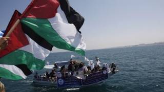 Israeli ships stalk pro-Palestinian aid flotilla