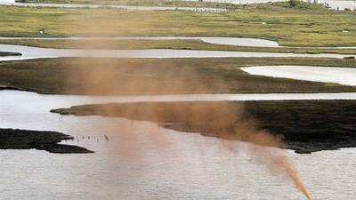 Barge hits well near Gulf, sends oil, gas spewing