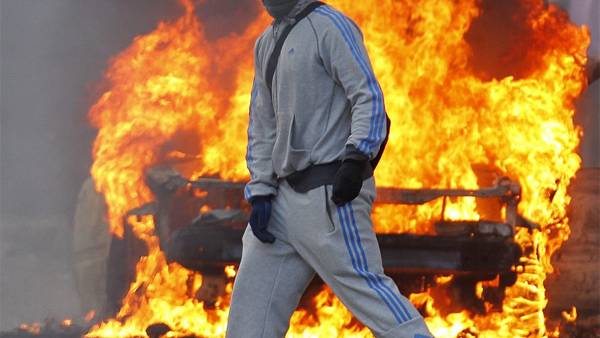 UK Riots: Government Prepares Troops, Martial Law