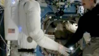 Human and Humanoid Robot Shake Hands in Space 1st