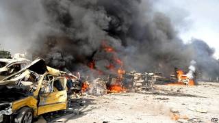 Syria unrest: Damascus ’suicide blasts’ kill dozens