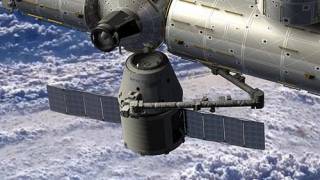 SpaceX capsule docks at space station, opens new era