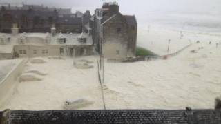 Foam covers Scottish village after freak storm