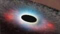 Super-Giant Black Hole Baffles Scientists