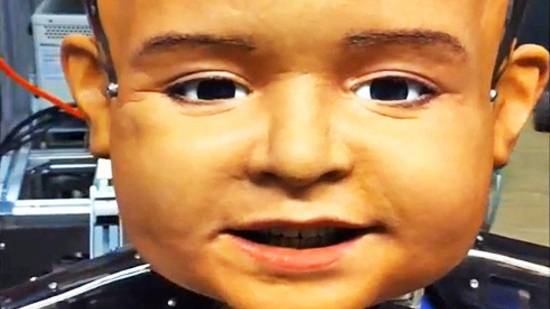 Robot baby has an expressive face only a programmer could love