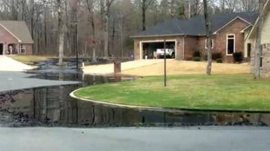 Exxon spill: ’I saw a river of oil heading down my street’