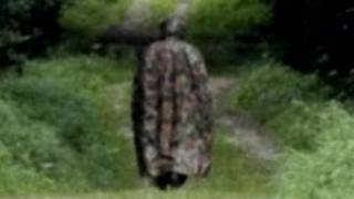 Scary mystery figure in cloak and mask haunts Swiss woods