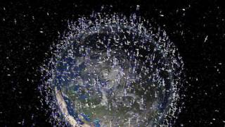 Japan scientists test tether to clear up space junk
