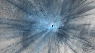 Spectacular Mars crater is a big blue boom