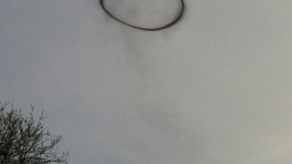 Experts baffled after strange black ring appears in sky above England