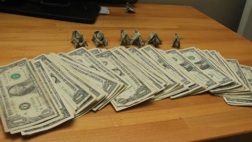 Man Pays Red Light Camera Ticket Using Origami Pigs in a Donut Box