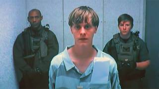 Charleston church victims' families forgive suspect in court (video of him in court)