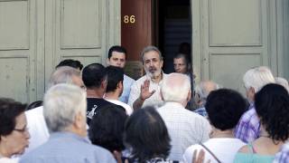 'Greece is on the edge of catastrophe. There will be riots and chaos': French central bank boss warns of dire consequences if the country does not make a deal this week