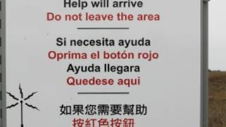 Border Patrol signs near the Mexico border in English, Spanish and Chinese