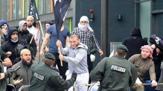 And so It begins…ISIS Flag Among Refugees in Germany Fighting the Police