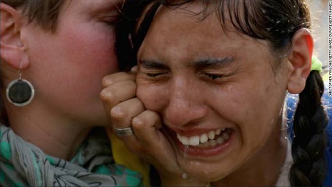 Media Lies Exposed: Woman is Dragged by Migrants to Police Line Where She Is Pepper-Sprayed for Cameras