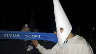 Migrant crisis: Finnish nationalists in KKK uniforms attack refugees with stones and fireworks
