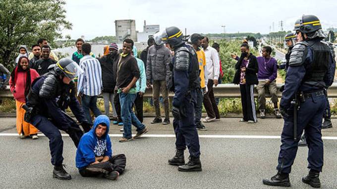 'No borders' activists from Britain are provoking migrant riots in Calais, French say