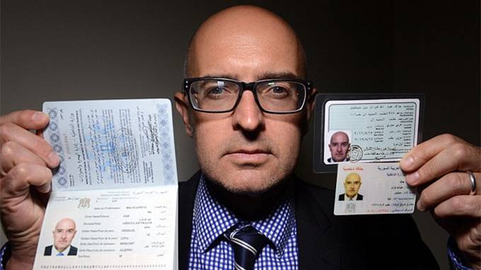 Germany 'overwhelmed' with false asylum seekers' Syrian passports