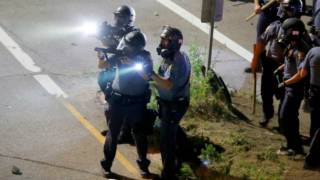 Protests over shootings block roads in U.S. cities, arrests made