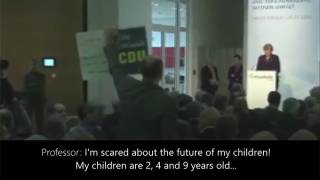 Professor Interrupts Merkel: "I'm Scared About the Future of My Children"
