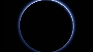 Pluto has RED ICE and Blue Skies
