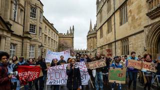 Oxford University students march through the city in a bid to get a statue of Cecil Rhodes removed