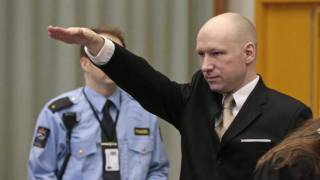 Norwegian mass killer Anders Breivik makes Nazi salute as he returns to court to improve inhuman jail conditions