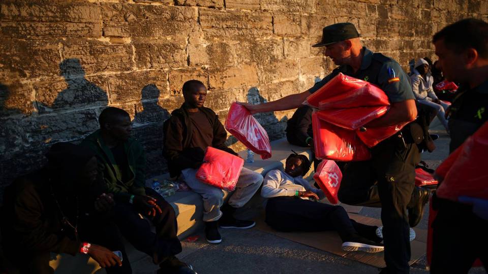 Dinghies Carrying Dozens of African Migrants Stun Sunbathers on Packed Beaches in Spain